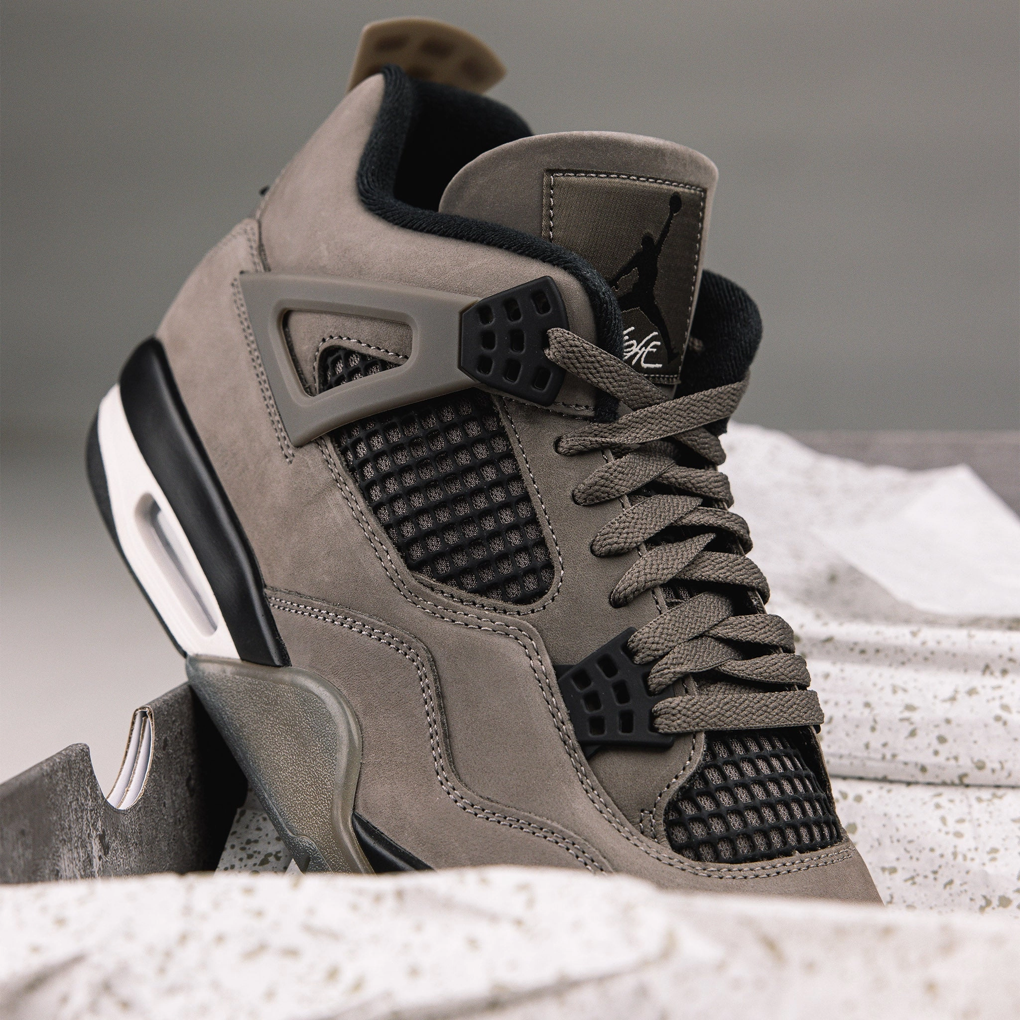 Jordan 4 Retro Cave Stone Impact Support Sturdy Build